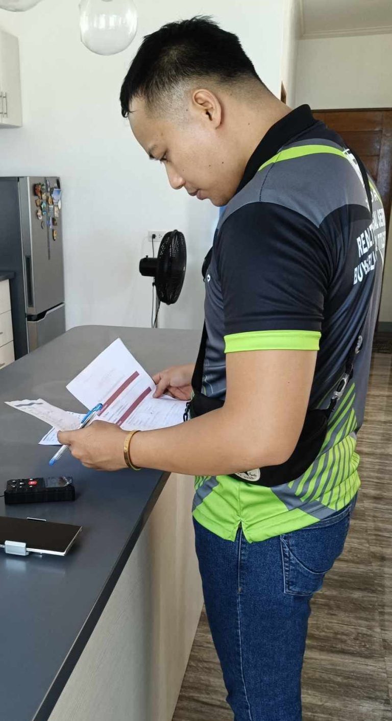 An appraiser conducting a site inspection in pagudpud ilocos norte philippines